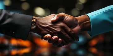 a close up of a handshake