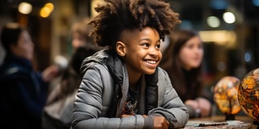 a child smiling at the camera