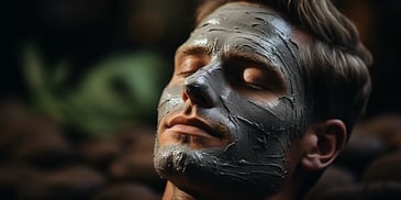 a person with a grey facial mask
