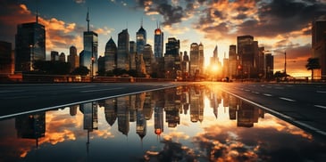 a city skyline with a reflection of the sun