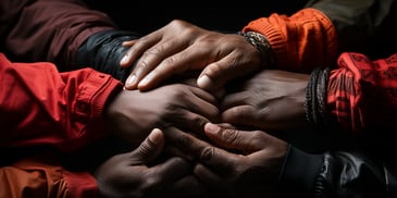 a group of hands holding each other