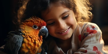 a child smiling with a bird