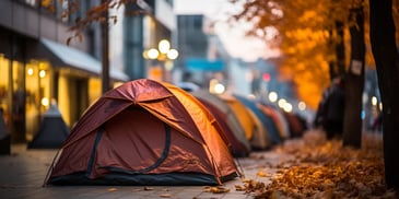 a group of tents on a sidewalk