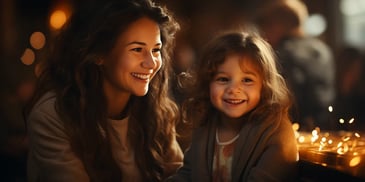 a person and a child smiling