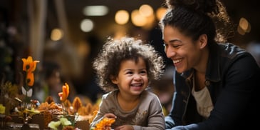 a person and a child smiling