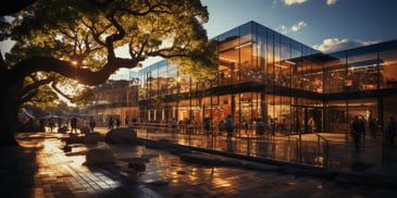 a building with glass walls and people walking in front of it