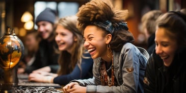 a person laughing with her eyes closed