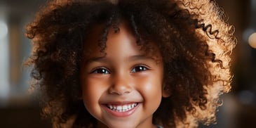 a close-up of a smiling child