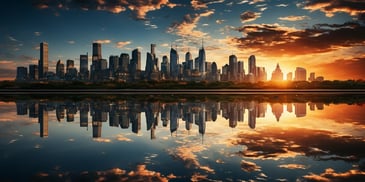 a city skyline with a body of water