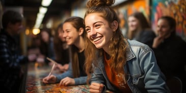 a group of childs smiling at a table
