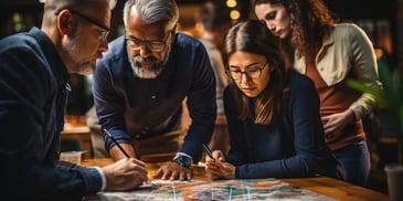 a group of people looking at a map